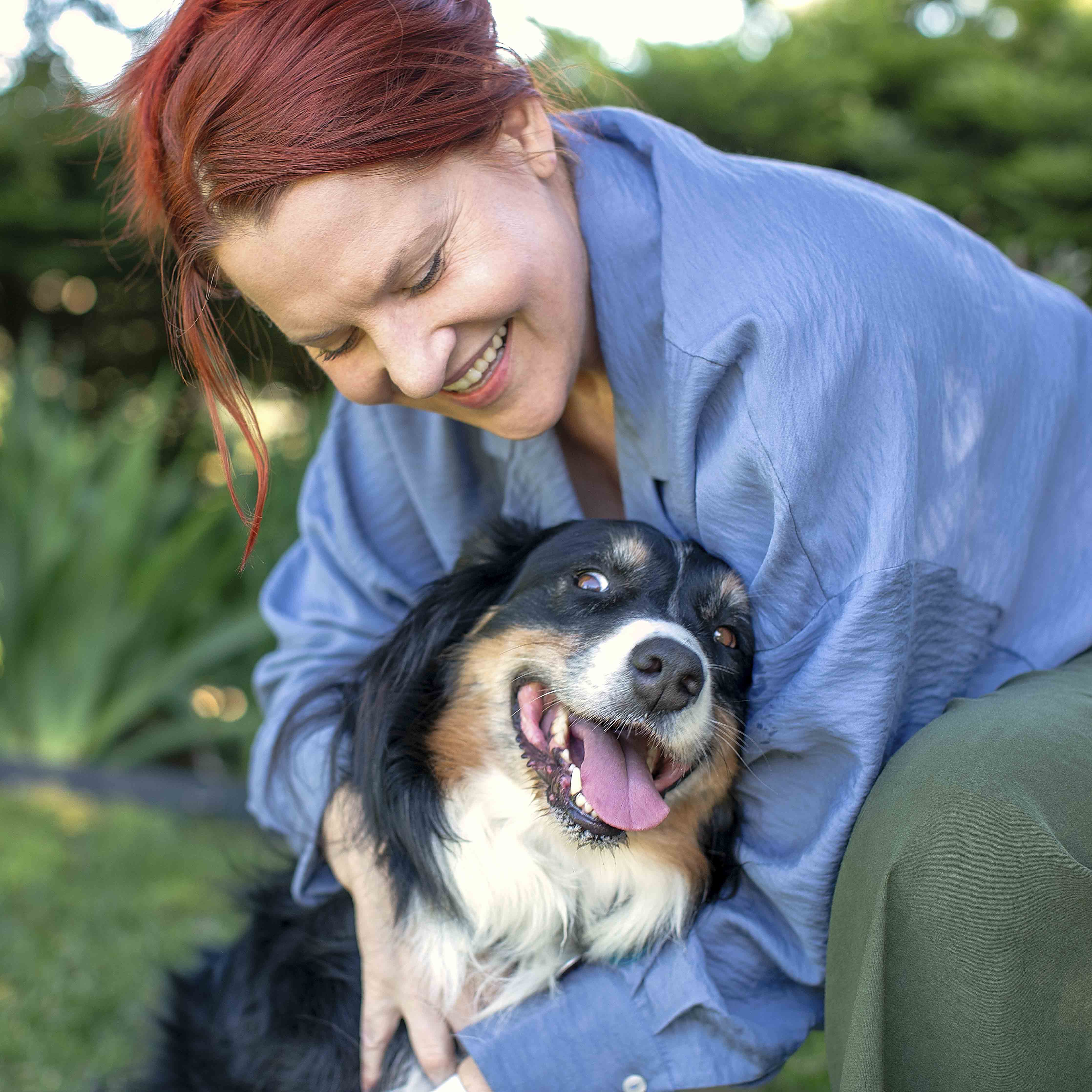 Chef Justine Kelly, Founder & CEO of puppops.com, with her dog River.