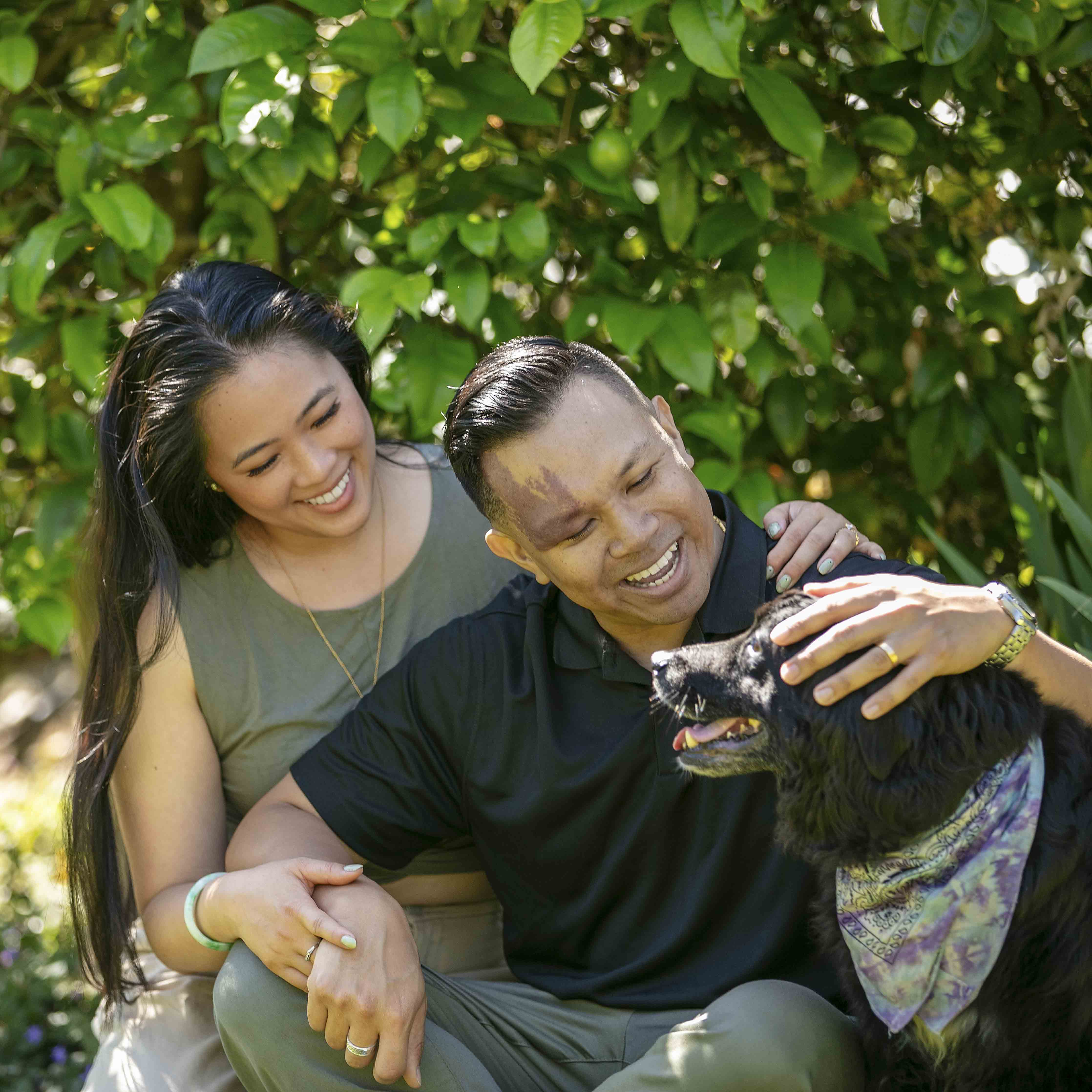 Couple with their fur baby